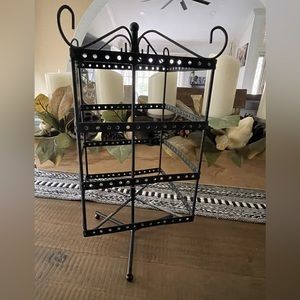 Black metal rotating holder for earrings